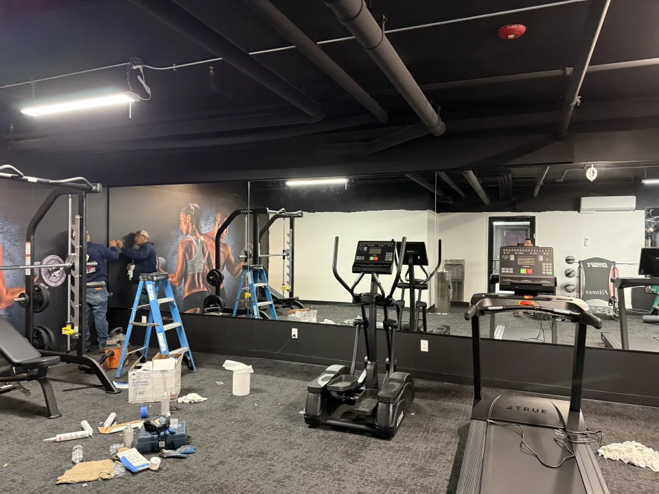 gym mirror wall installation
