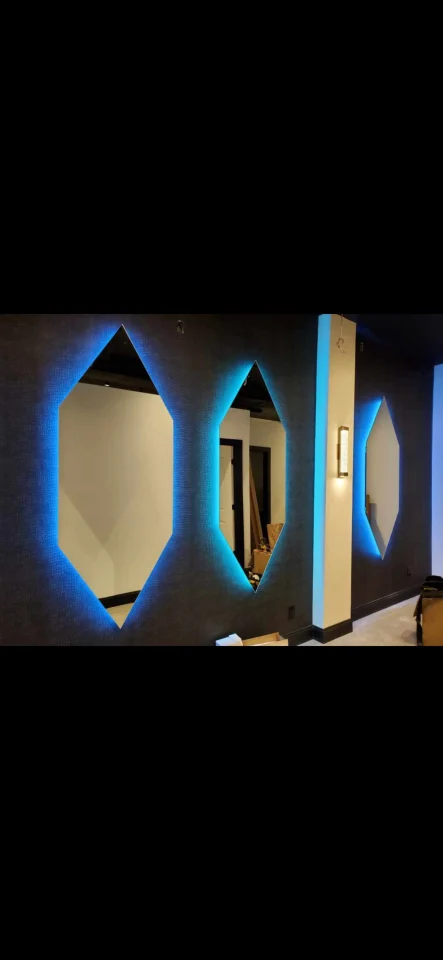 bathroom wall multiple mirror installation with backlighting installation